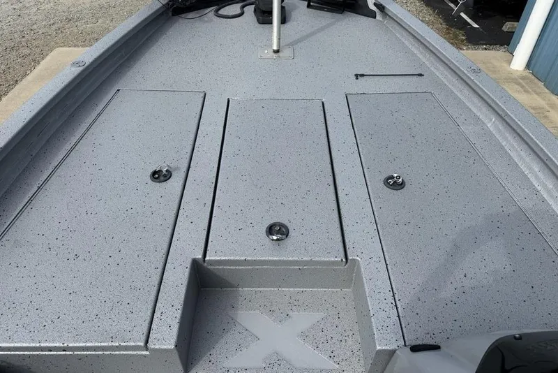 Slide: The Image of 2016 Xpress XCLUSIVE SERIES X21 boat deck with storage compartments. - 9