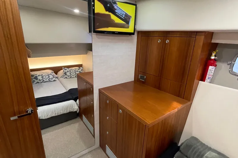 Slide: The Image of Luxurious interior of 2020 Maritimo 59 Motoryacht with cozy bed and seating area. - 40
