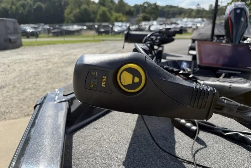 Slide: The Image of Close-up of a 2023 Vexus AVX189 boat's trolling motor control handle. - 11
