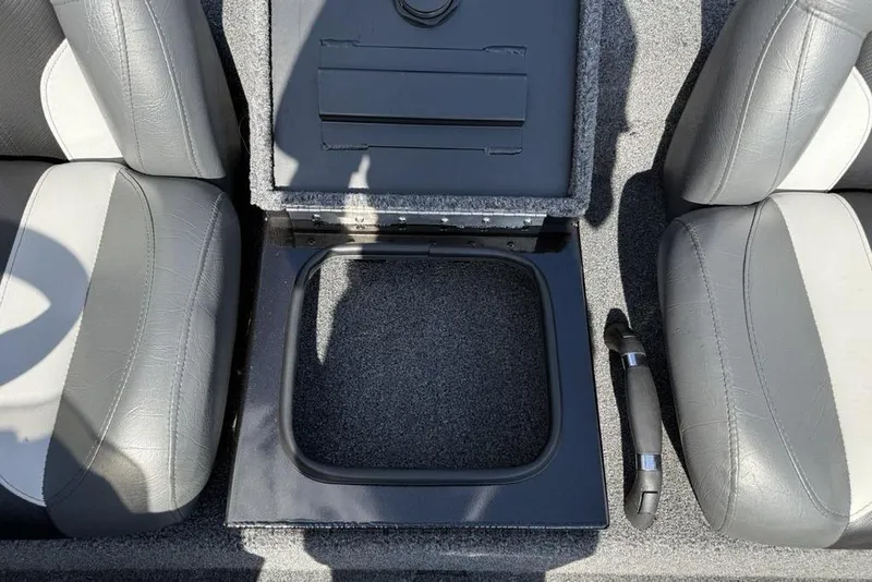 Slide: The Image of 2023 Vexus AVX189 boat interior storage compartment between gray seats. - 17