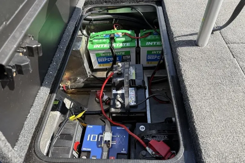 Slide: The Image of 2023 Vexus AVX189 boat battery compartment with Interstate deep cycle batteries. - 20