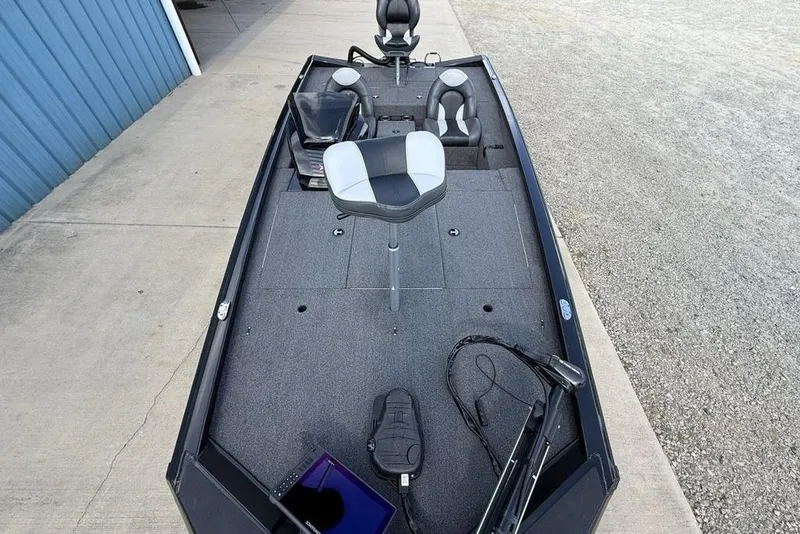 Slide: The Image of 2023 Vexus AVX189 boat interior with seating and fishing equipment on deck. - 25