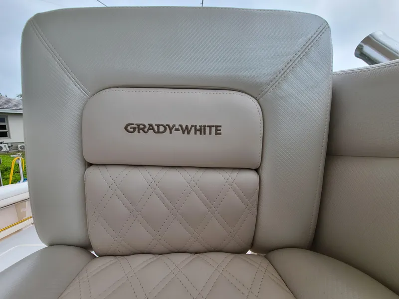 Slide: The Image of Grady-White Express 360 2011 boat seat with logo and diamond stitching. - 14