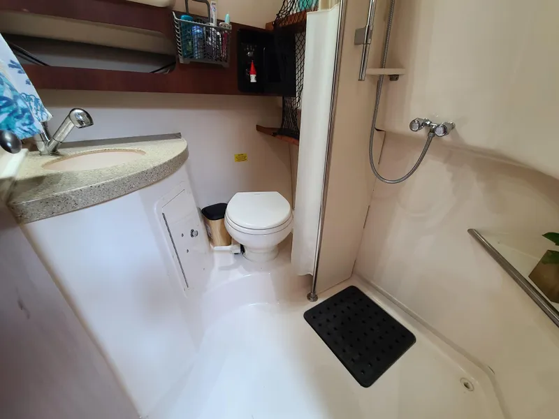 Slide: The Image of Bathroom interior of 2011 Grady-White Express 360 boat with shower and toilet. - 21