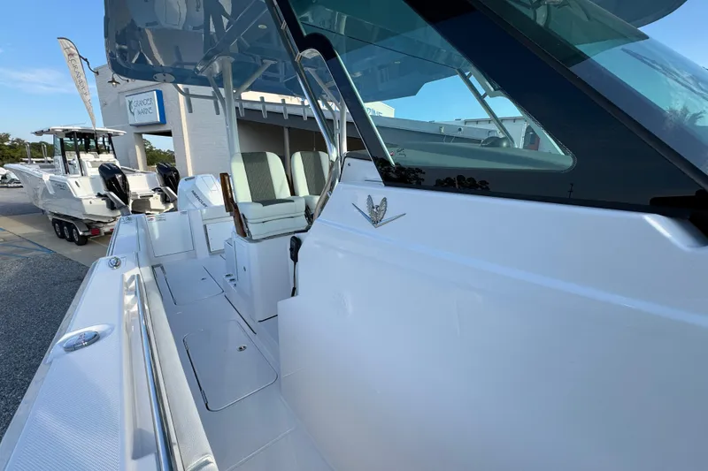 Slide: The Image of 2026 Bertram 34CC boat exterior with sleek design and modern features. - 19