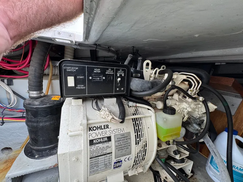 Slide: The Image of Engine compartment of a 2001 Mainship 390 with Kohler power system. - 45