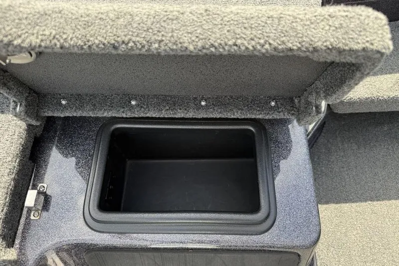 Slide: The Image of 2023 Ranger RT198P boat storage compartment with open lid, showcasing interior space. - 10