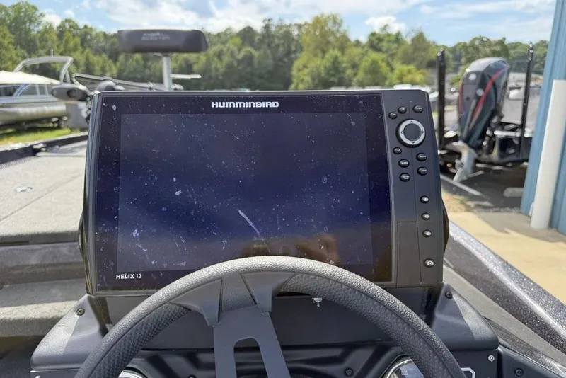 Slide: The Image of 2023 Ranger RT198P boat dashboard with Humminbird Helix 12 fishfinder display. - 11