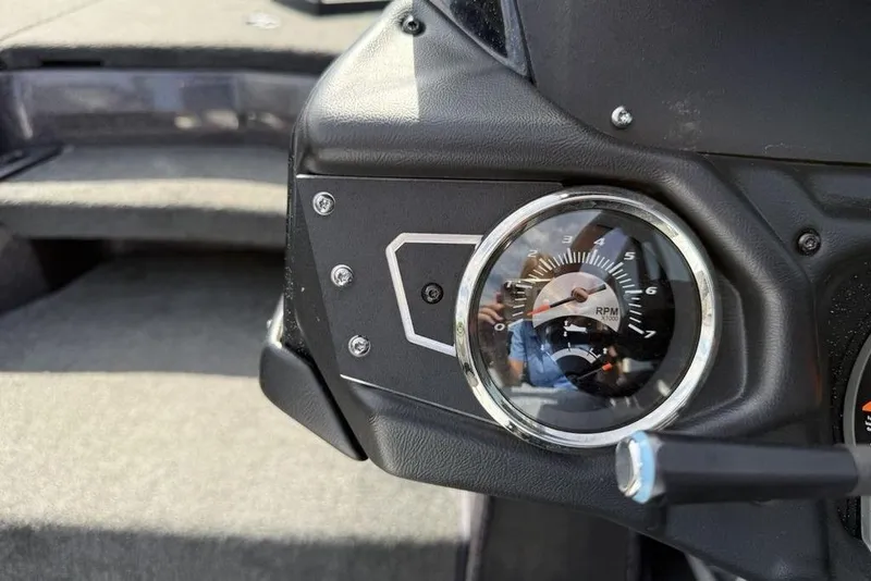 Slide: The Image of Close-up of 2023 Ranger RT198P boat RPM gauge on dashboard. - 15