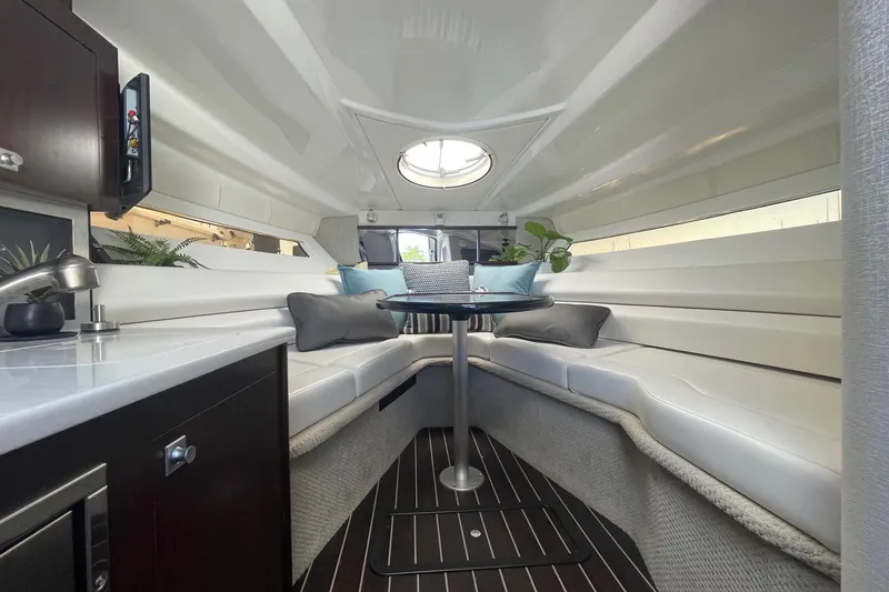 Slide: The Image of Luxurious interior of 2018 Monterey 295 Sport Yacht with sleek seating and modern decor. - 21