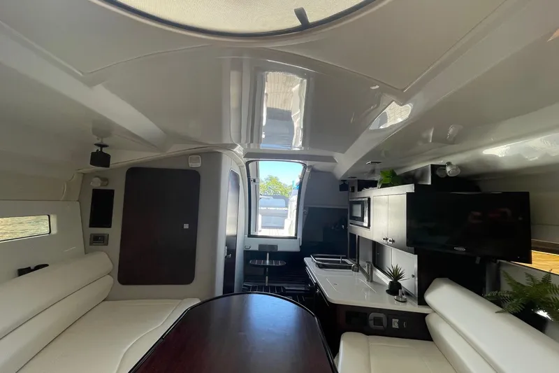 Slide: The Image of Interior of 2018 Monterey 295 Sport Yacht with modern amenities and sleek design. - 22