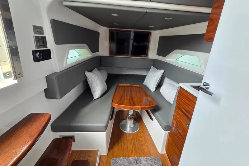 Slide: The Image of Luxurious interior of 2025 Valhalla Boatworks V-46 with modern seating and wooden accents. - 29