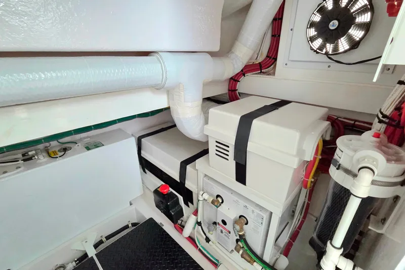 Slide: The Image of Engine room of 2025 Valhalla Boatworks V-46, featuring ventilation and electrical systems. - 35