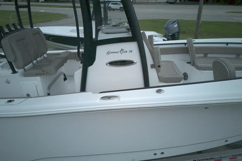 Slide: The Image of 2026 Sea Hunt Gamefish 28 Forward Seating boat with spacious interior and comfortable seating. - 16