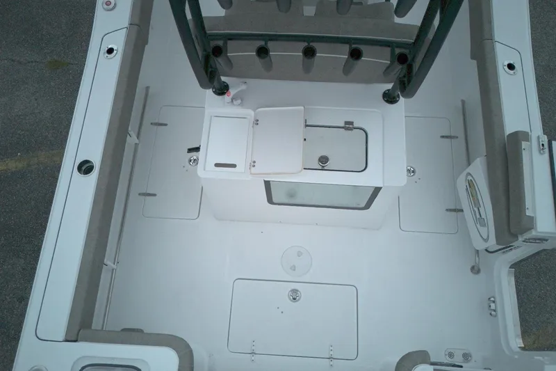 Slide: The Image of 2026 Sea Hunt Gamefish 28 Forward Seating boat interior, featuring spacious deck and storage compartments. - 19