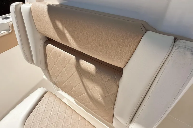 Slide: The Image of 2019 Pioneer 266 Pelagic boat seat with beige and white upholstery. - 20