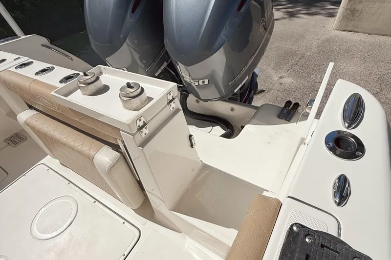 Slide: The Image of 2019 Pioneer 266 Pelagic boat with dual engines and beige seating. - 36