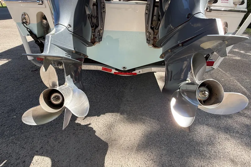 Slide: The Image of Dual outboard motors on a 2019 Pioneer 266 Pelagic boat, close-up view. - 9