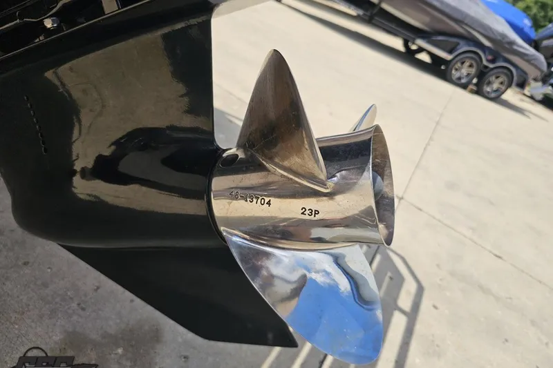 Slide: The Image of Close-up of a 2002 Baja 25 Outlaw boat propeller on a sunny day. - 30