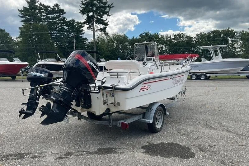 Slide: The Image of 2000 Boston Whaler 160 Dauntless boat on trailer with Mercury outboard motor. - 8