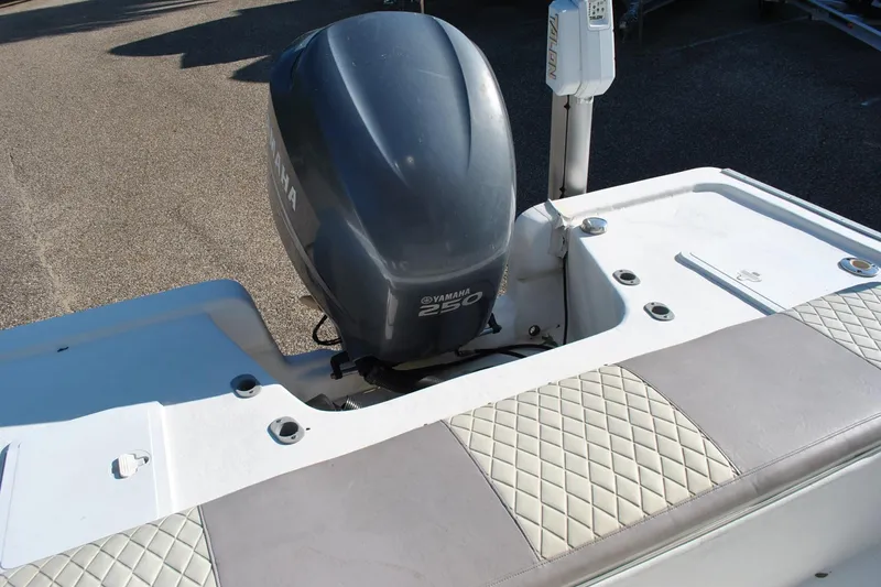 Slide: The Image of 2005 Cape Horn 22 Bay boat with Yamaha 250 outboard motor, featuring quilted seating. - 13