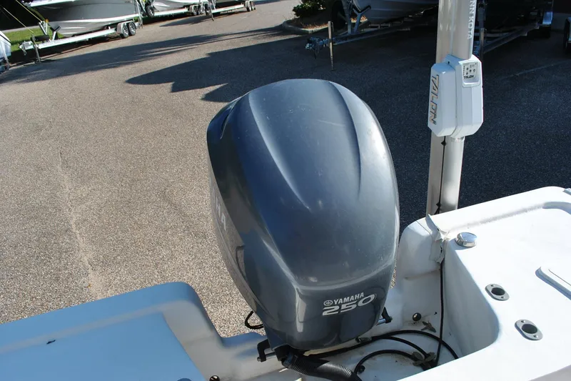 Slide: The Image of 2005 Cape Horn 22 Bay boat with Yamaha 250 outboard motor in a parking area. - 15