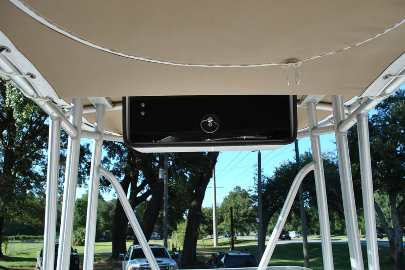 Slide: The Image of 2005 Cape Horn 22 Bay boat T-top with electronics box, outdoor setting. - 18