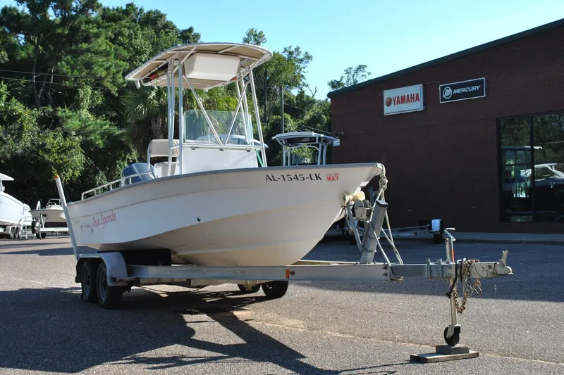 Slide: The Image of 2005 Cape Horn 22 Bay boat on trailer outside Yamaha and Mercury dealership. - 4