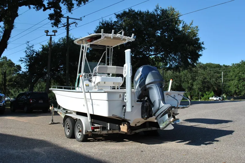 Slide: The Image of 2005 Cape Horn 22 Bay boat on trailer with Yamaha outboard motor in parking lot. - 9