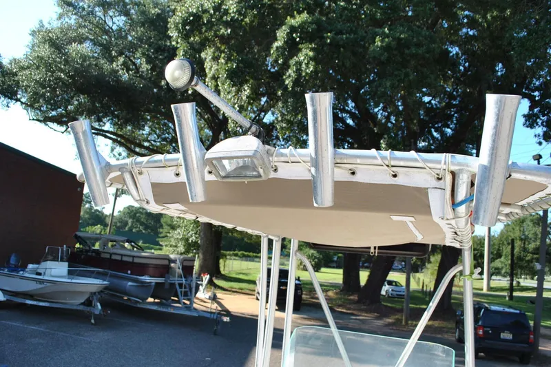 Slide: The Image of 2005 Cape Horn 22 Bay boat with rod holders and spotlight on T-top. - 21