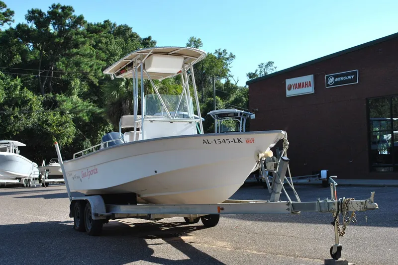 Slide: The Image of 2005 Cape Horn 22 Bay boat on trailer near Yamaha and Mercury dealership. - 5