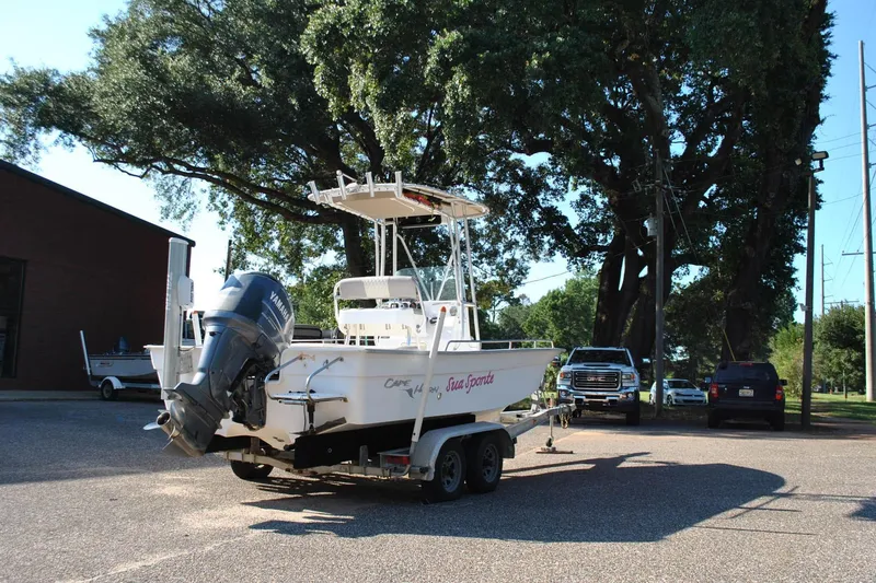 Slide: The Image of 2005 Cape Horn 22 Bay boat on trailer with Yamaha outboard motor in parking lot. - 7