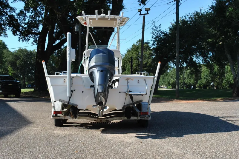 Slide: The Image of 2005 Cape Horn 22 Bay boat on trailer, rear view, parked outdoors. - 8