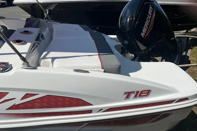 Slide: The Image of 2022 Tahoe T18 boat with Mercury engine, featuring sleek design and comfortable seating. - 6