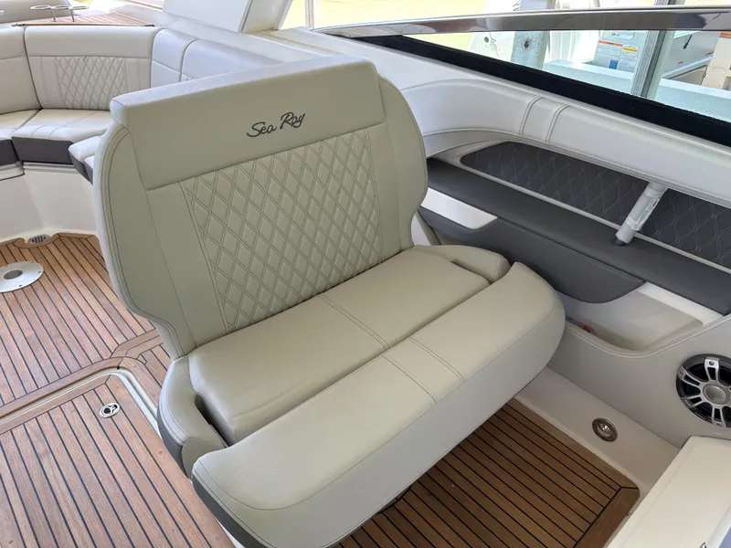 Slide: The Image of Luxurious seating on the 2023 Sea Ray SLX 310 OB boat with elegant stitching. - 6