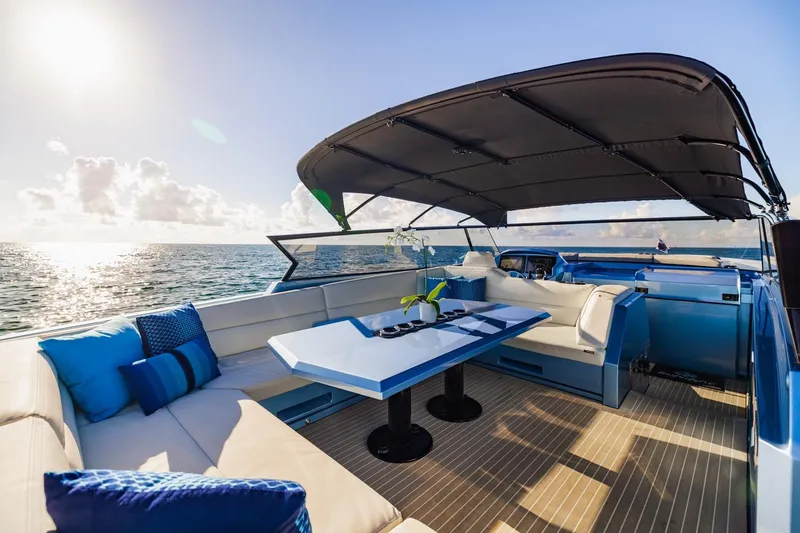 Slide: The Image of Luxurious 2019 Vanquish Yachts VQ58 with elegant seating, ocean view, and modern design. - 27