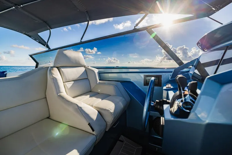 Slide: The Image of Luxurious interior of 2019 Vanquish Yachts VQ58 with ocean view and sunlight. - 34