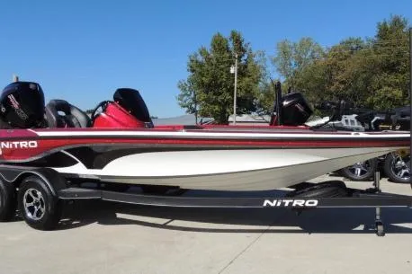 Slide: The Image of 2019 Nitro Z19 Pro boat parked at Cabela's, featuring sleek design and powerful engine. - 1