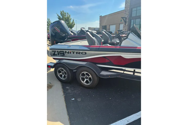 Slide: The Image of 2019 Nitro Z19 Pro boat parked near Cabela's store sign. - 2