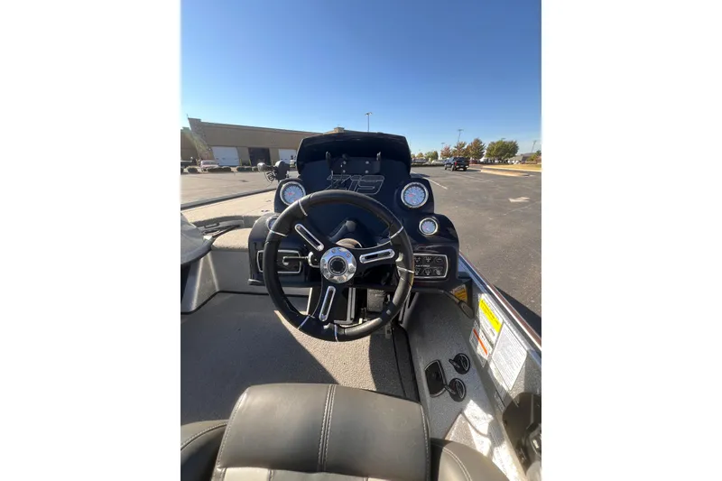 Slide: The Image of 2019 Nitro Z19 Pro boat cockpit with steering wheel and dashboard controls. - 8