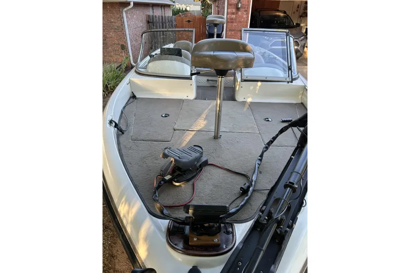 Slide: The Image of 2004 Ranger 190 VS boat with fishing seat and trolling motor on deck. - 2