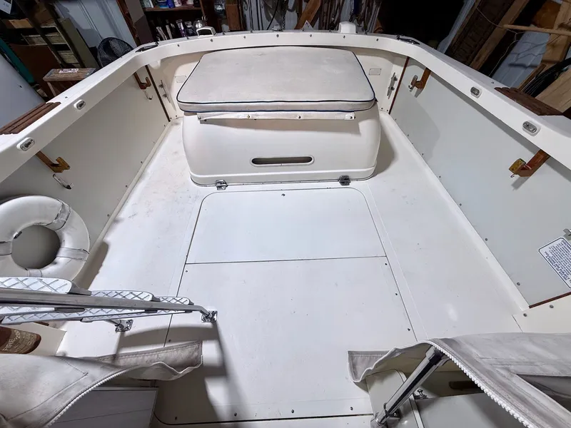 Slide: The Image of 1973 Bertram Sport Fisherman boat interior with seating and storage compartments. - 3