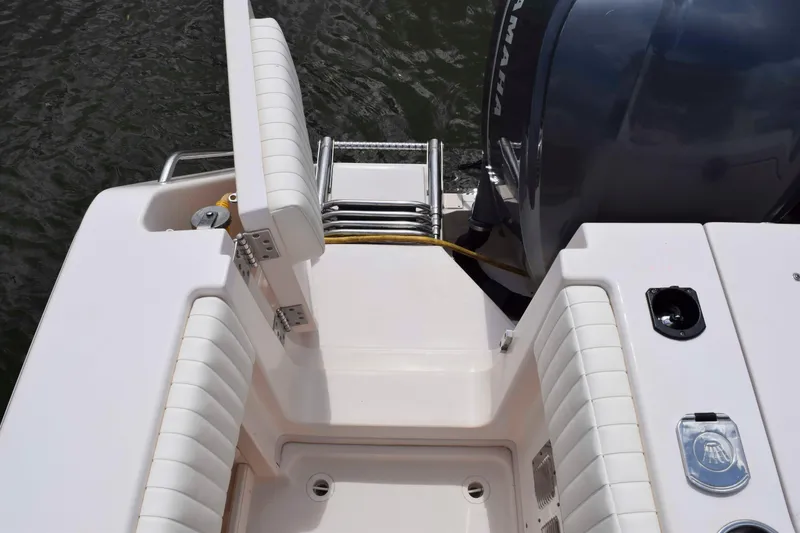 Slide: The Image of 2012 Grady-White Express 360 boat stern with seating and Yamaha outboard motor. - 24