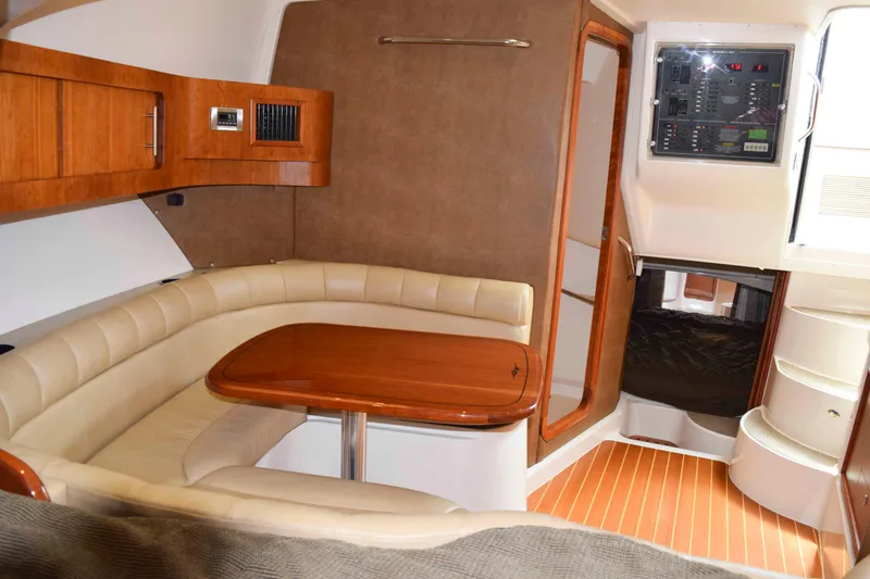 Slide: The Image of Luxurious interior of 2012 Grady-White Express 360 boat with seating and control panel. - 29