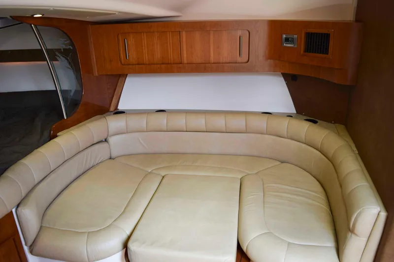 Slide: The Image of Luxurious interior of 2012 Grady-White Express 360 with beige leather seating. - 32