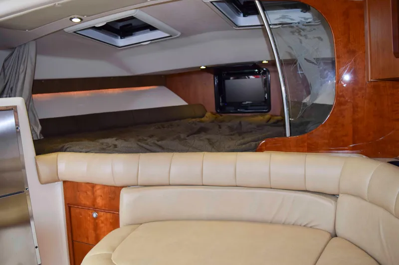 Slide: The Image of Luxurious interior of 2012 Grady-White Express 360 boat with cozy seating and sleeping area. - 33