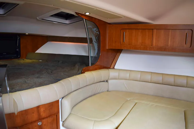 Slide: The Image of Luxurious interior of 2012 Grady-White Express 360 with leather seating and wood cabinetry. - 34