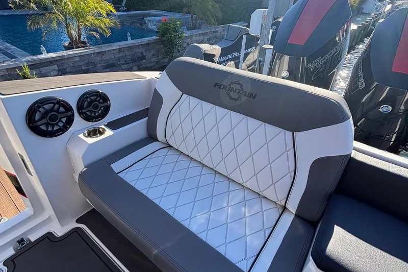 Slide: The Image of 2023 Fountain 38 SCX boat dashboard with advanced navigation displays and controls. - 26