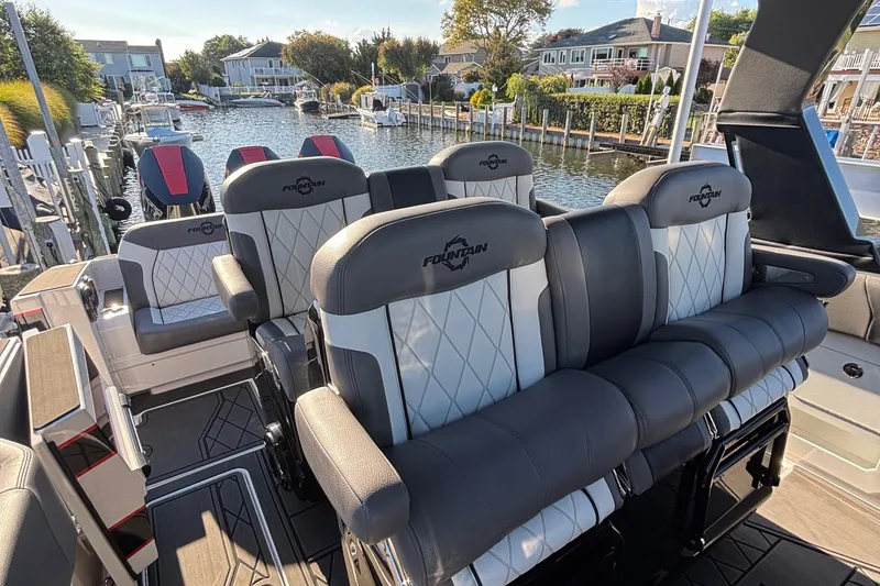 Slide: The Image of 2023 Fountain 38 SCX boat interior with sleek design and modern dashboard. - 29
