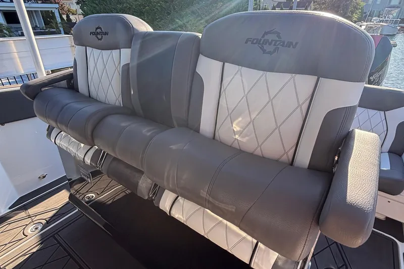 Slide: The Image of 2023 Fountain 38 SCX boat interior with luxurious seating and modern design. - 31